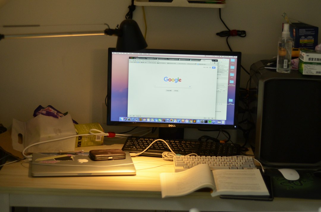 Desktop computer on a desk, used to open the hidden WindowsApps folder in Windows