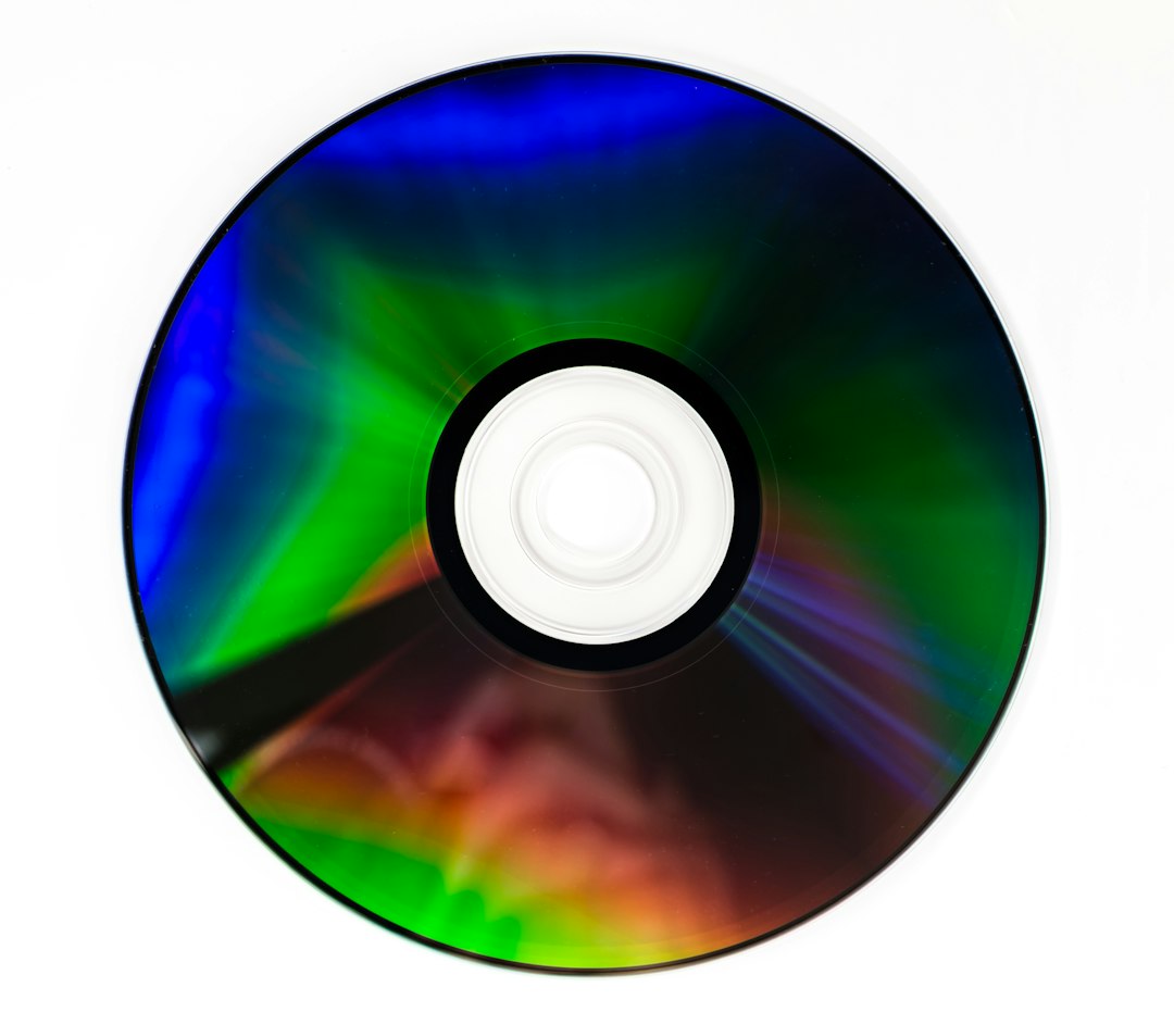 Close-up of a DVD disc, representing adding a virtual CD/DVD drive so Install VMware Tools is available