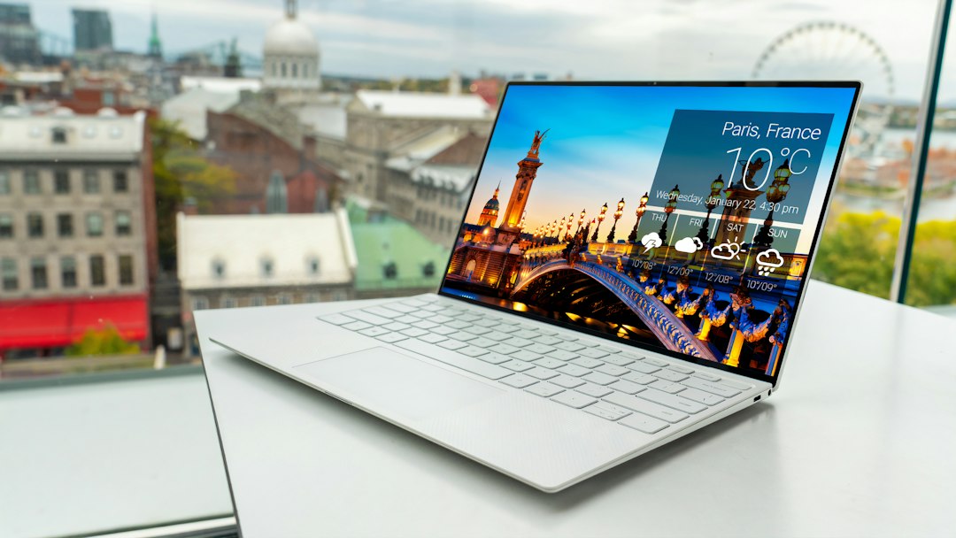 Laptop on a desk used to allow AnyDesk through Windows Defender Firewall and open ports 80, 443 and 6568