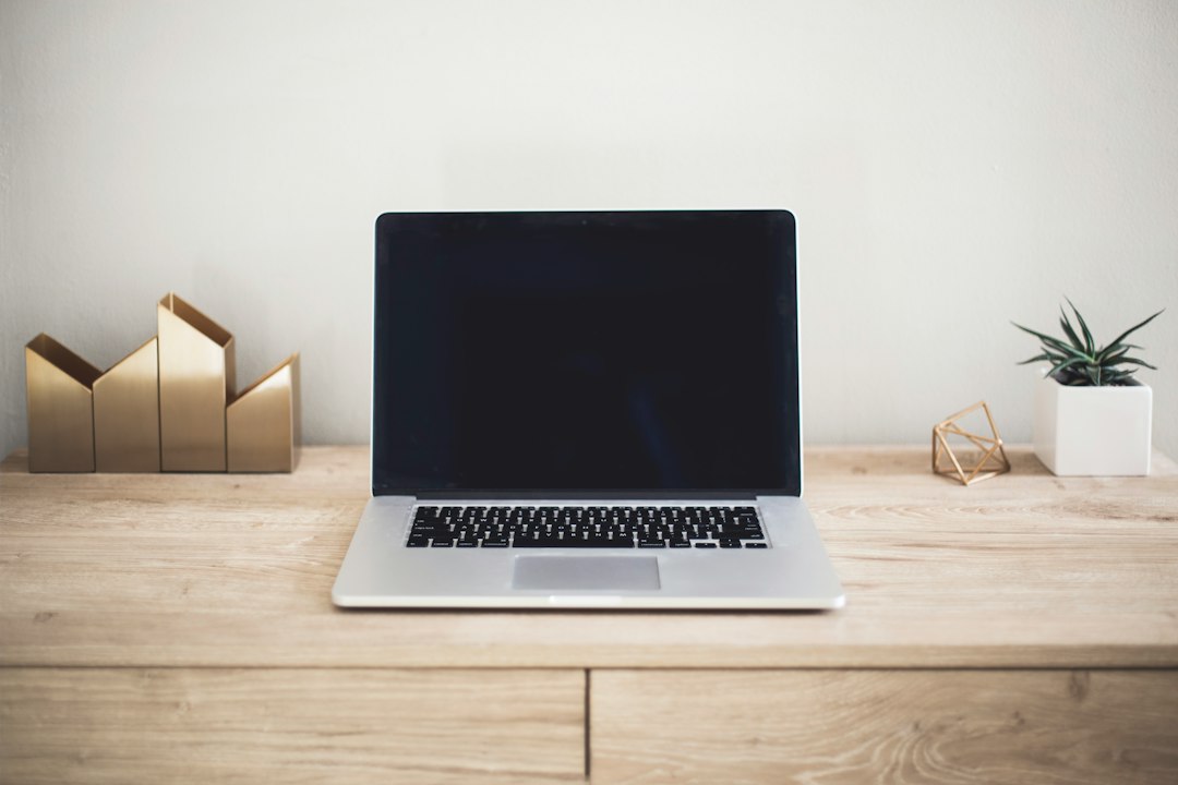 Laptop on a clean desk, representing a Windows PC where Microsoft Edge can't be uninstalled