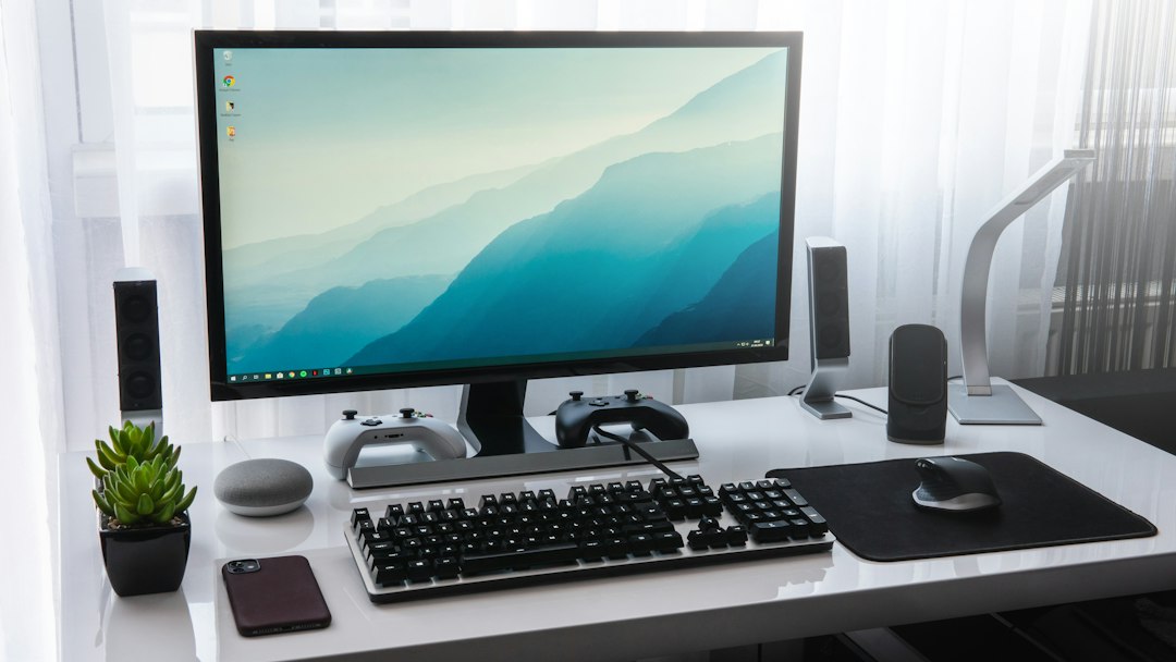 Minimal desk setup with a monitor, representing checking the monitor input source and video cable