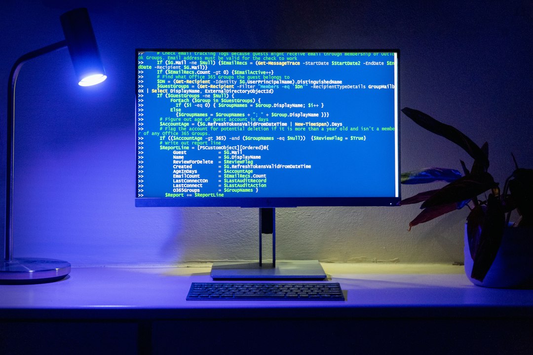 Monitor showing command text, representing running chkdsk and sfc from the recovery Command Prompt