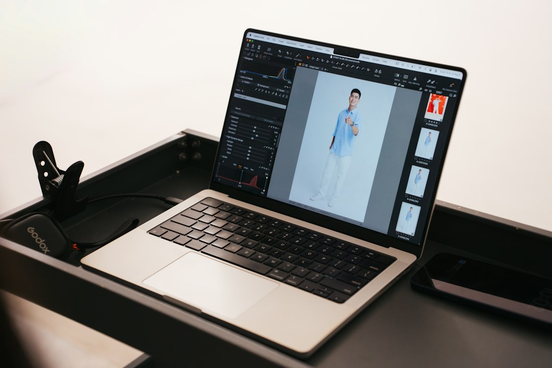 Photo editing on a laptop, where a surprise Creative Cloud update can interrupt work