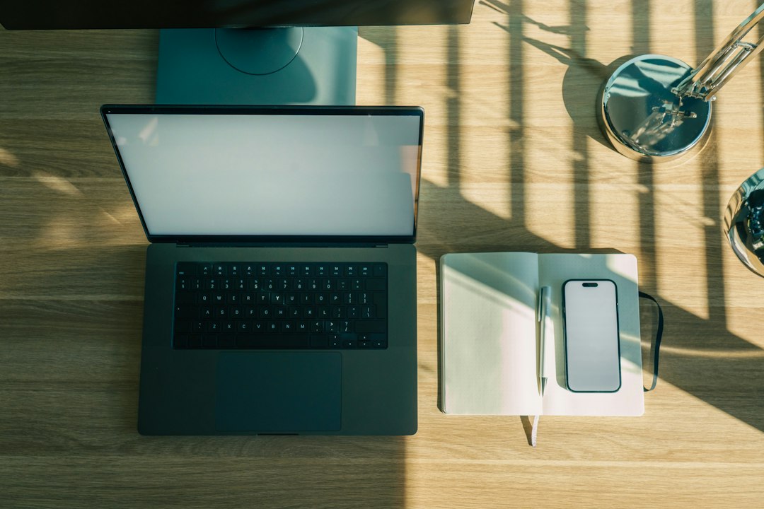Windows laptop on a desk, where Bing web results appear in Start menu search