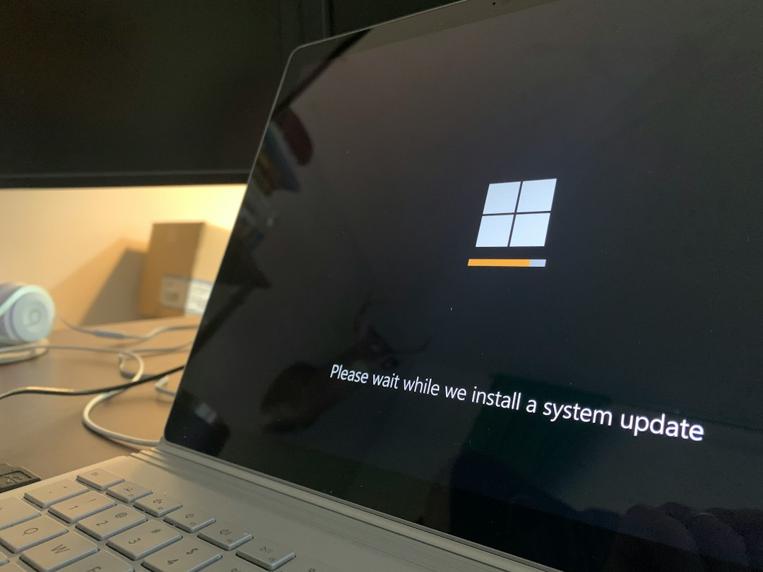 Windows Update screen on a laptop, where error 0x800f081f can appear when an update fails