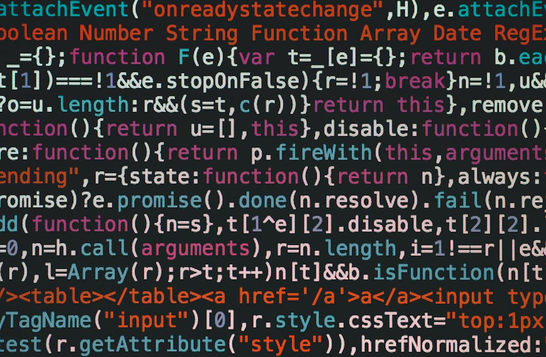 Lines of code on a dark screen, representing extracting a driver CAB file with the expand command