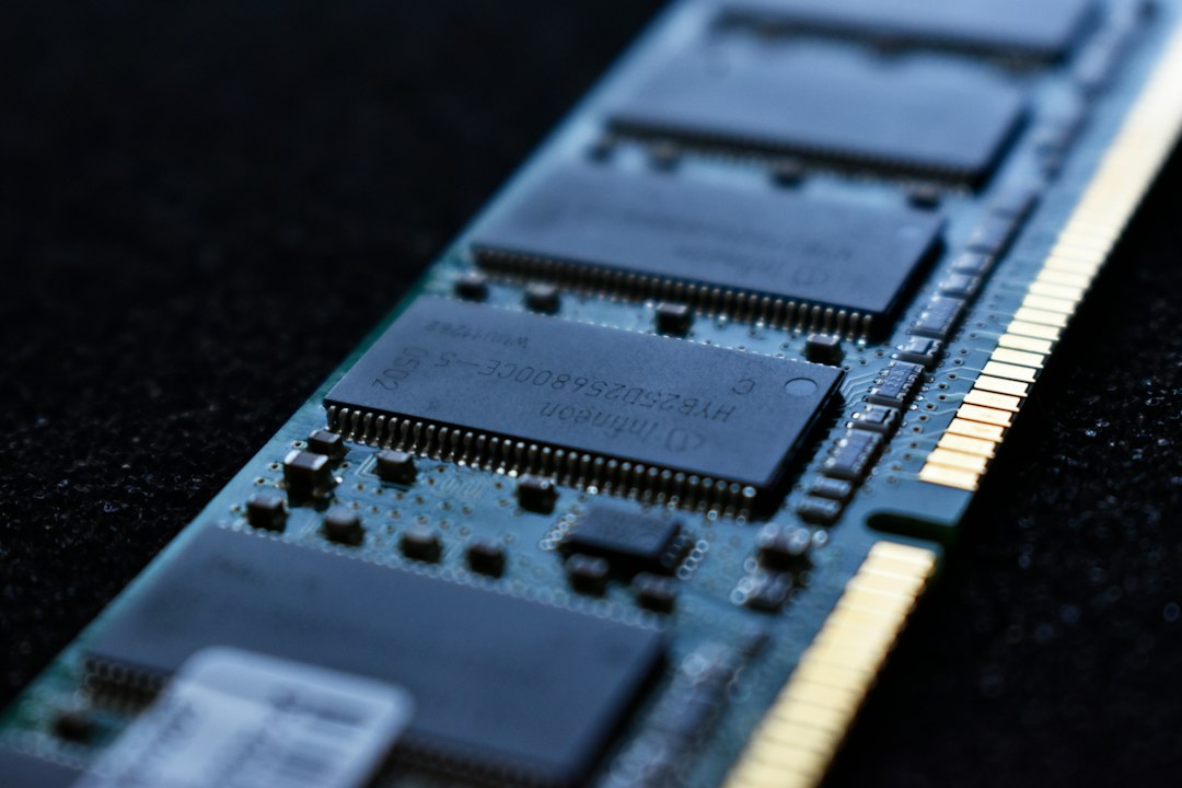Close-up of computer chips on a circuit board, representing the hardware drivers that cause BAD_POOL_CALLER