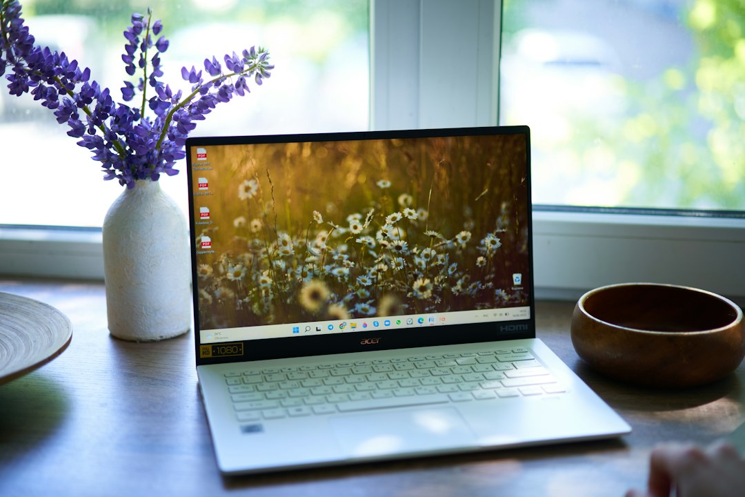 Laptop computer on a table, representing doing a full shutdown in Windows without Fast Startup
