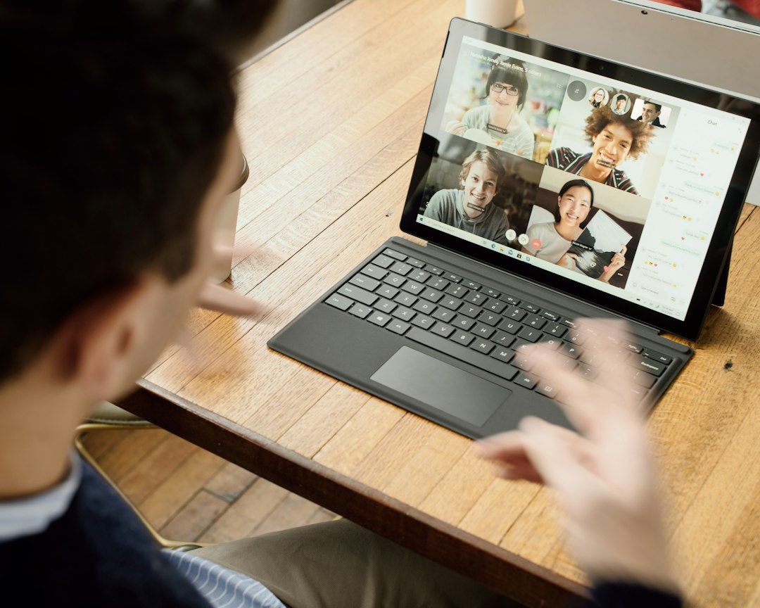Person using Microsoft Teams on a laptop where GIFs are not working in chat
