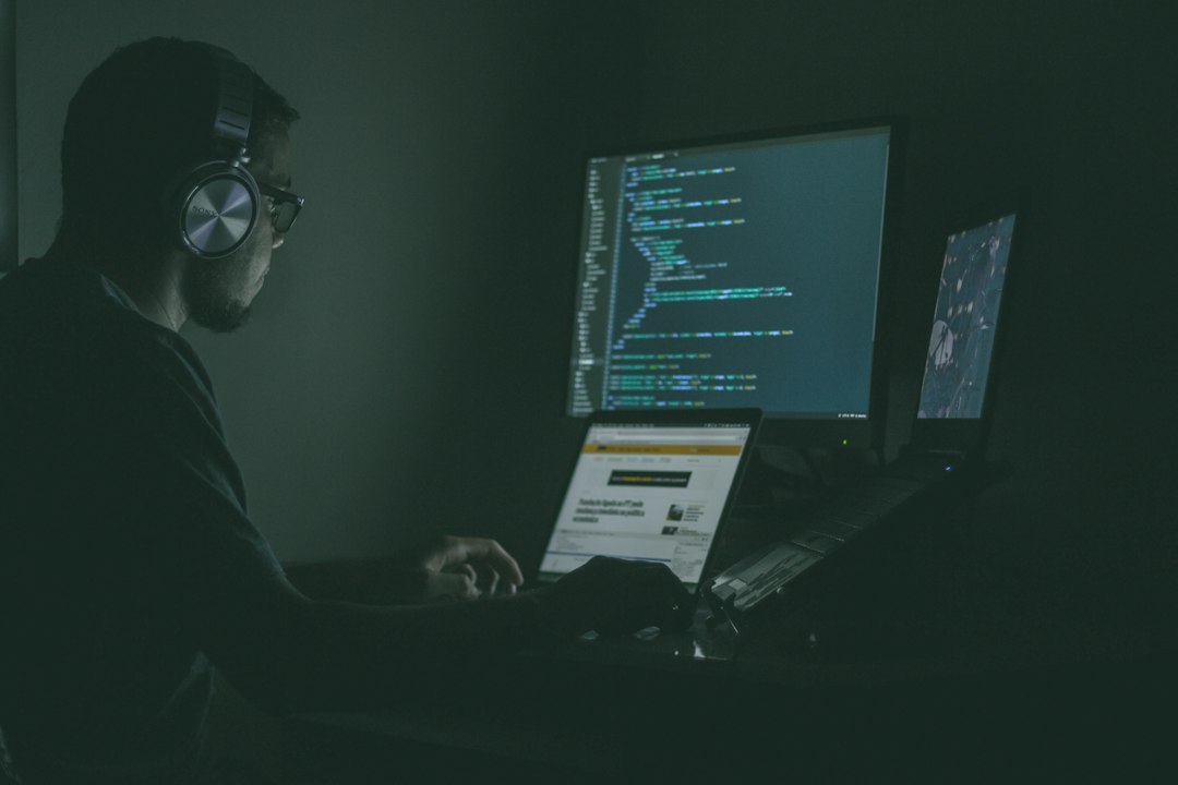 Code on a computer screen, representing the Group Policy settings that remove web results from Windows Search