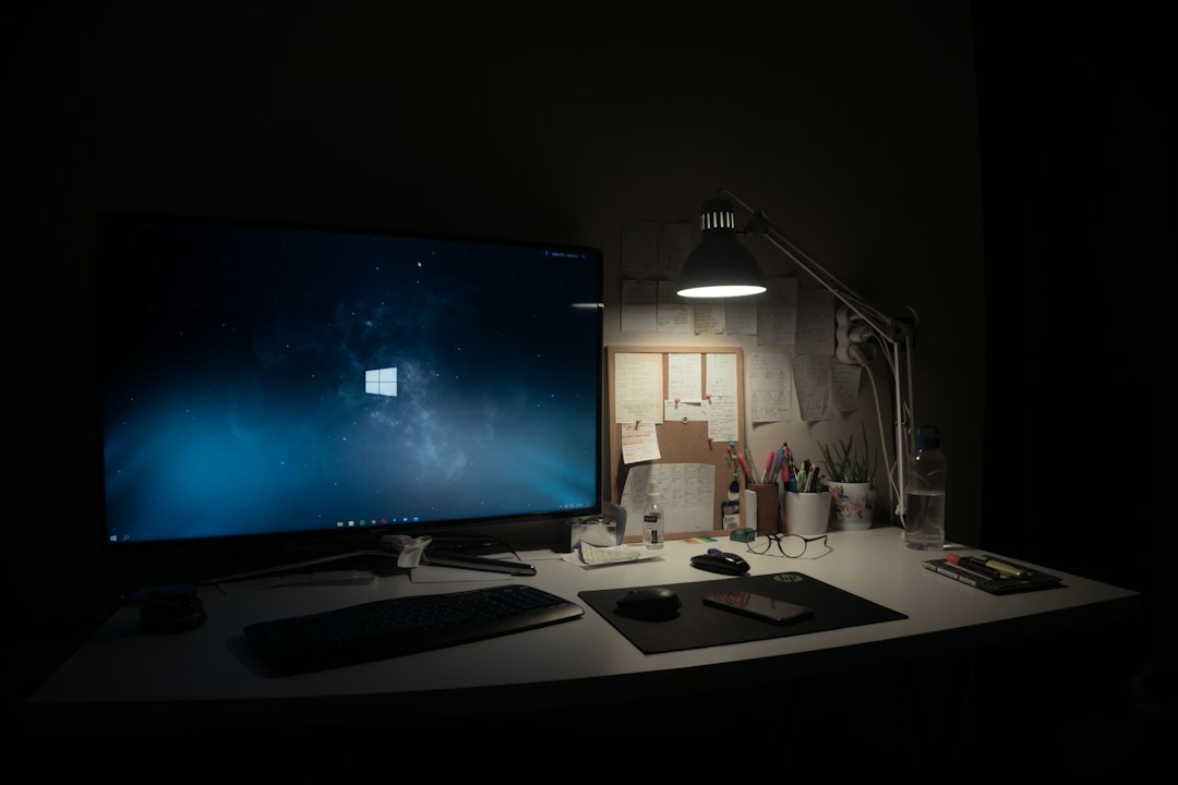Computer monitor on a white desk, representing Install VMware Tools greyed out in VMware Workstation