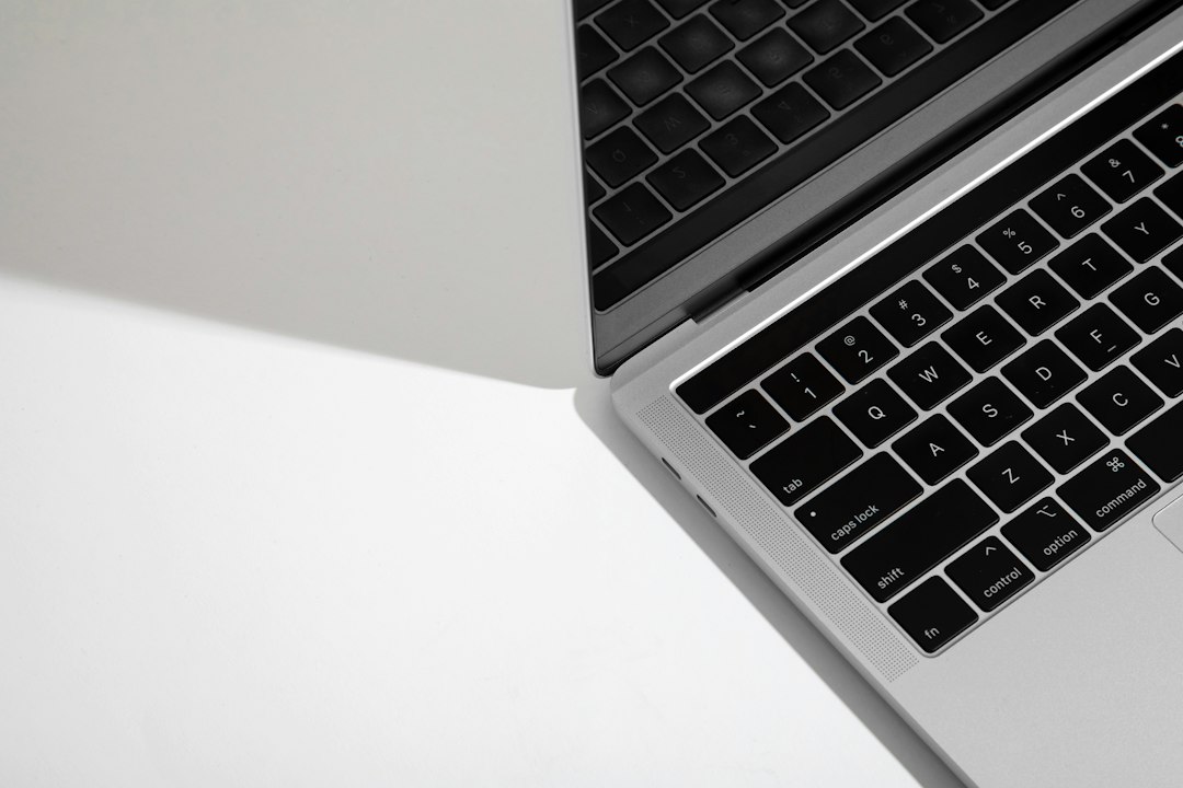 Laptop with a touchpad, whose scroll settings and sensitivity can cause automatic scrolling in Windows