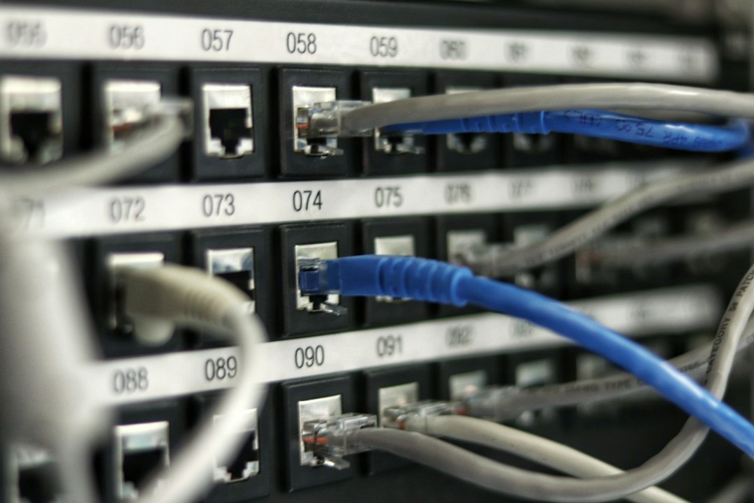 Network switch with Ethernet cables, connecting a Windows 10 PC to a shared folder it can map as a drive