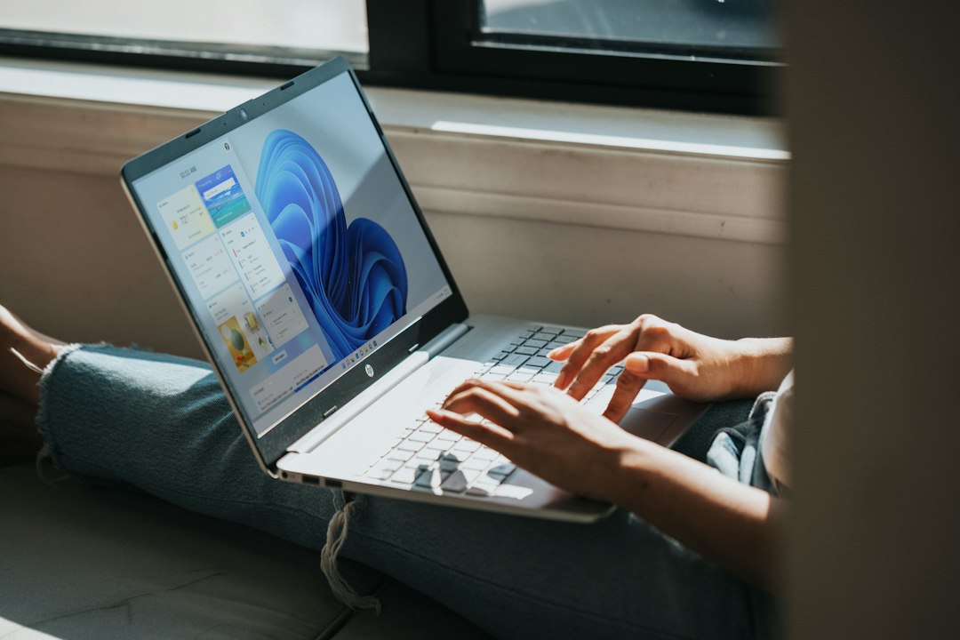 Person working on a Windows 11 computer that is missing the Microsoft Store app