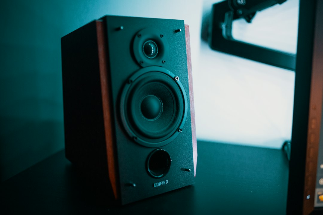 Speaker on a desk, representing checking that sound works again after fixing the Intel High Definition DSP driver