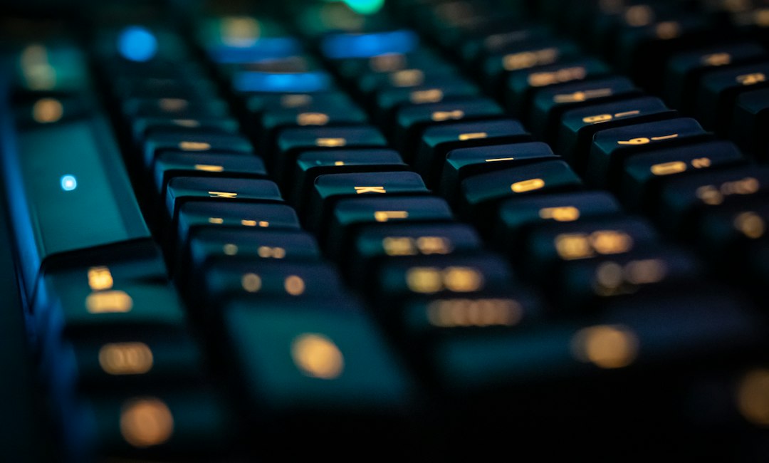 Black computer keyboard with a numeric keypad, representing Num Lock not working in Windows
