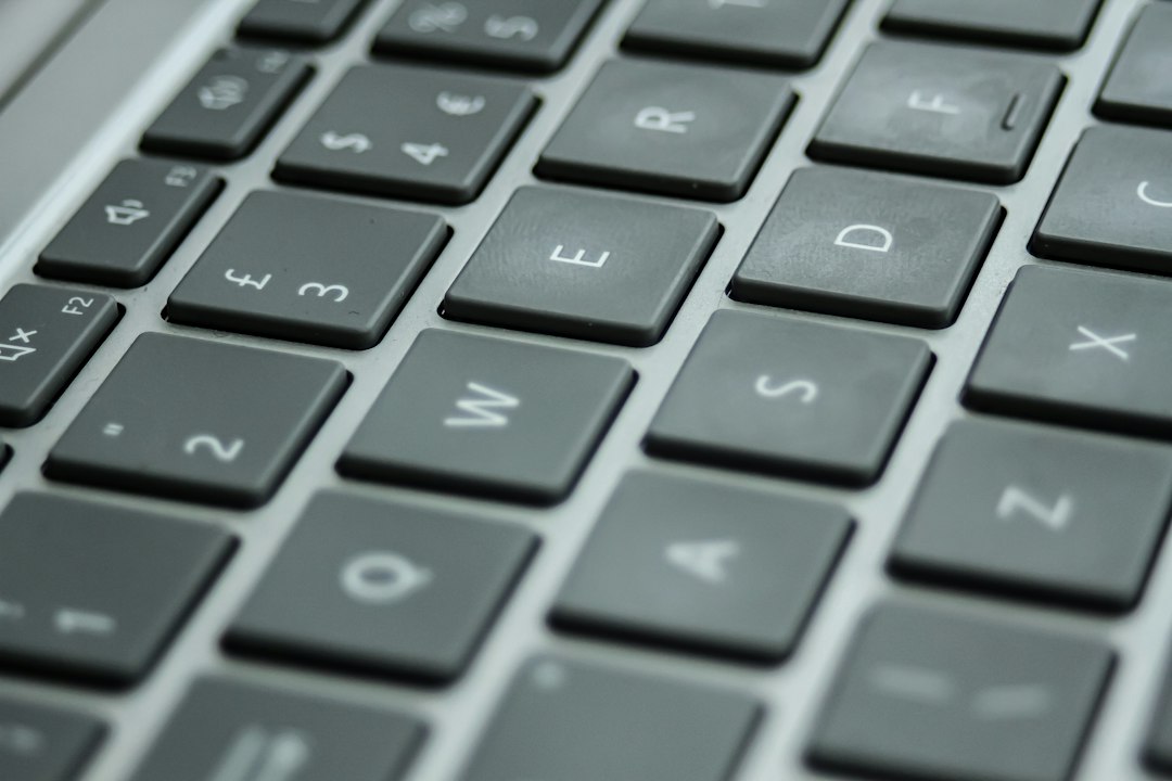 Close-up of a laptop keyboard, representing using the Fn key to turn Num Lock on a laptop without a number pad