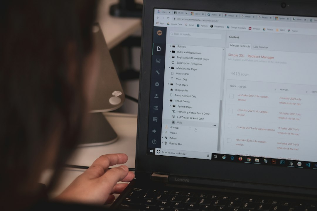 Person using a laptop, representing Outlook rules, Quick Steps and scheduled send to automate the inbox
