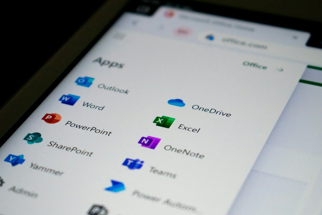 Phone screen with app icons, including work apps like Microsoft Teams