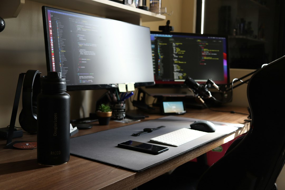 Computer desk with two monitors, used to reset the Windows Update components