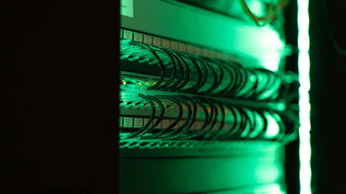 Server hardware in a rack, where the Print key in the Registry holds the RpcAuthnLevelPrivacyEnabled value