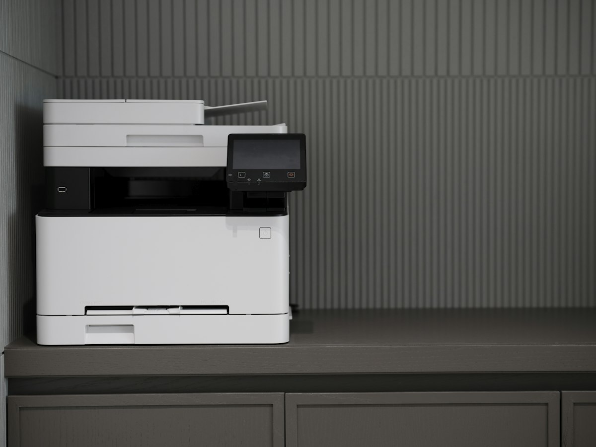 Office copier shared from a print server where RpcAuthnLevelPrivacyEnabled controls the RPC authentication level