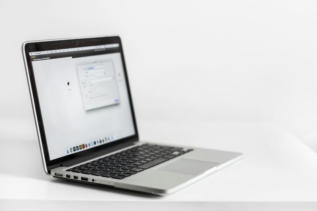 Laptop on a desk, representing the STATUS_ACCESS_VIOLATION page crash in Chrome or Edge