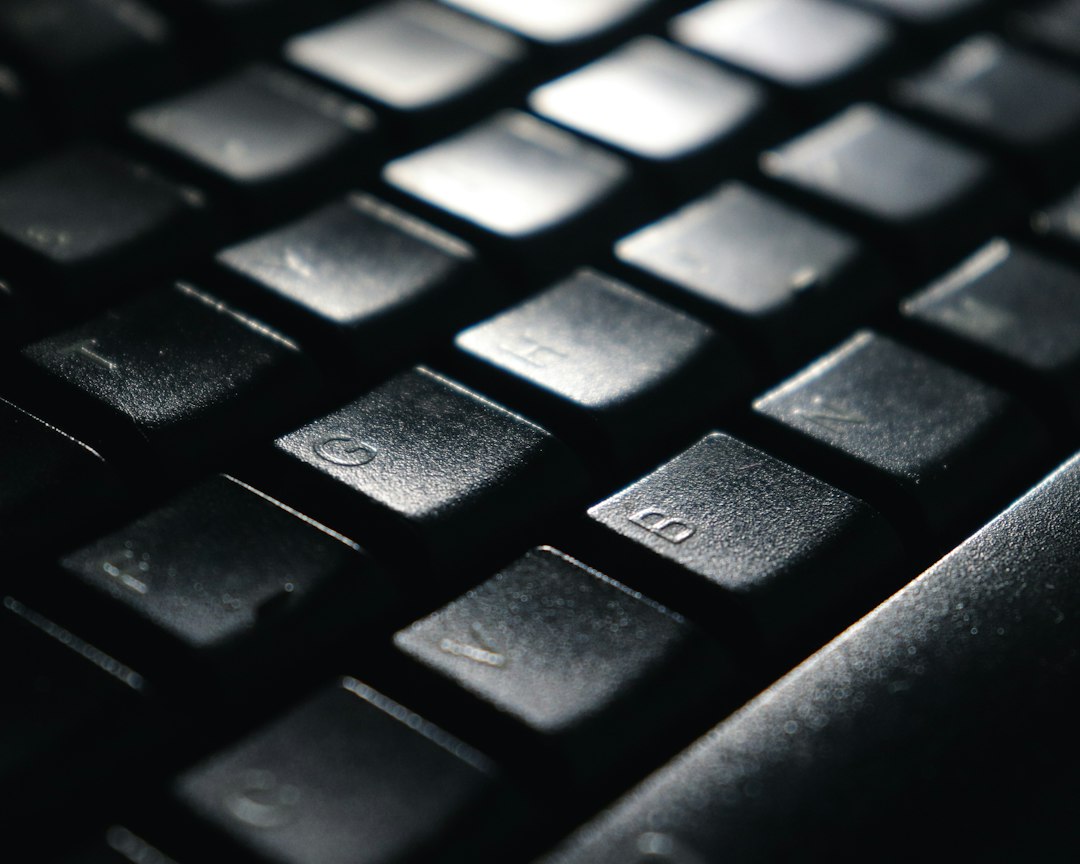 Close-up of a black keyboard, representing keeping Num Lock on at Windows startup