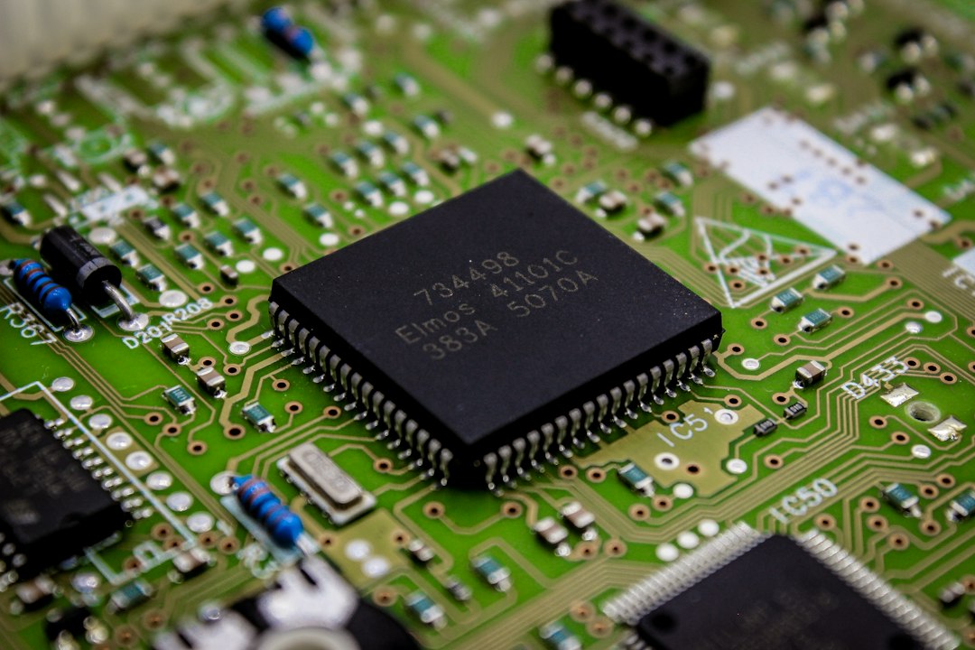 Close-up of a chip on a circuit board, where the PC's firmware stores its Secure Boot keys