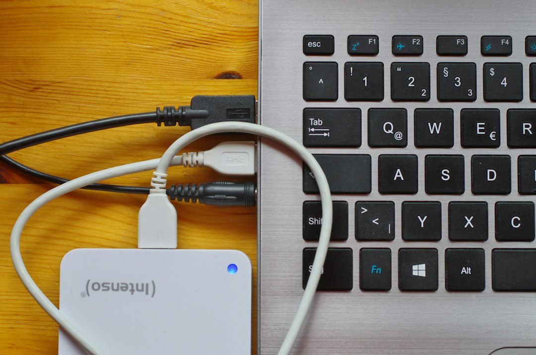 USB cable plugged into a laptop, an accessory worth unplugging when testing for DPC watchdog crashes