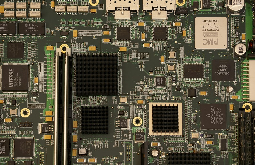 Green and black computer motherboard, representing updating the BIOS and removing extra hardware before a Windows upgrade