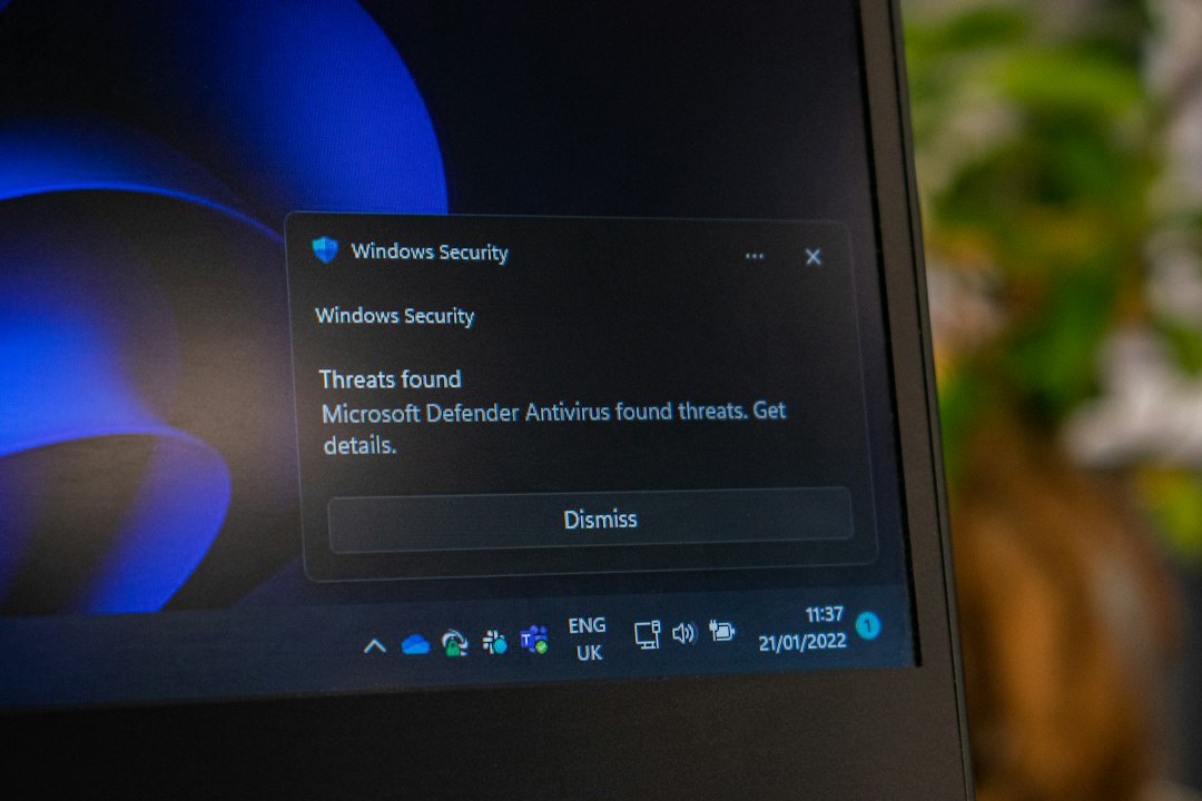 Laptop screen with Windows settings open, used to install the latest Windows 11 version