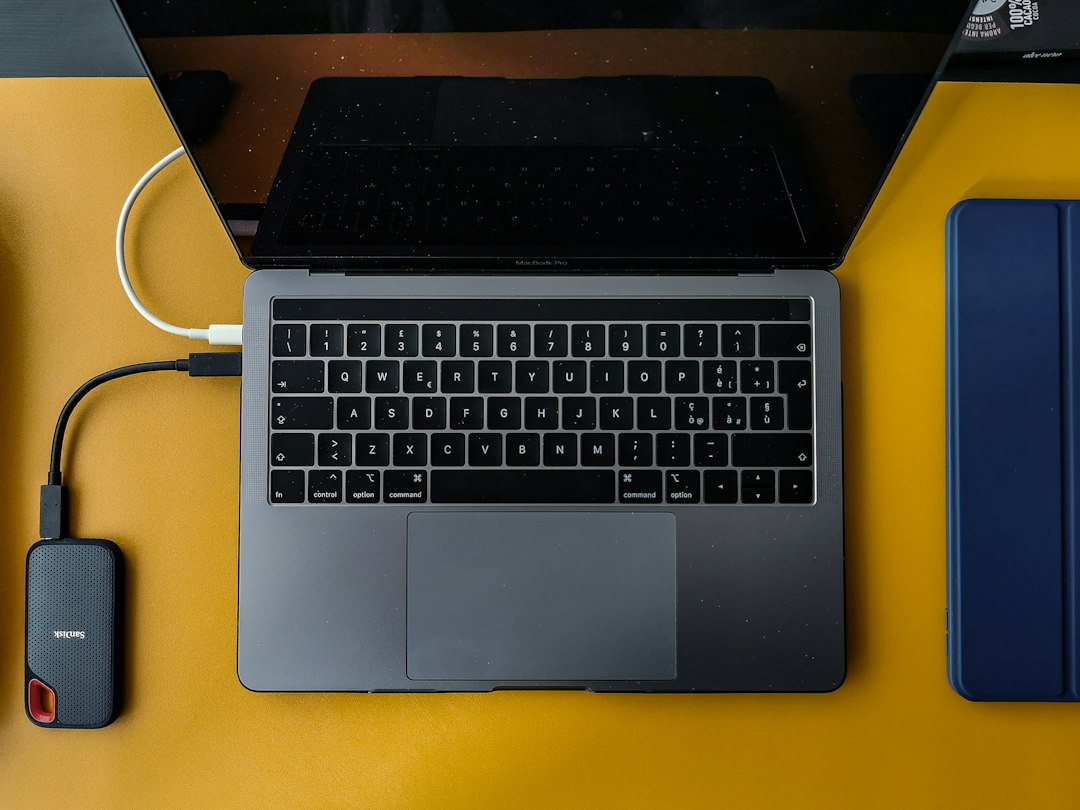 Laptop on a desk ready to change a drive volume serial number with VolumeID